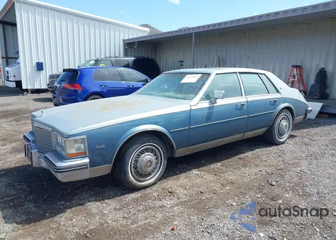1985 Cadillac Seville z USA, uszkodzony, nr VIN 1G6KS698XFE804240